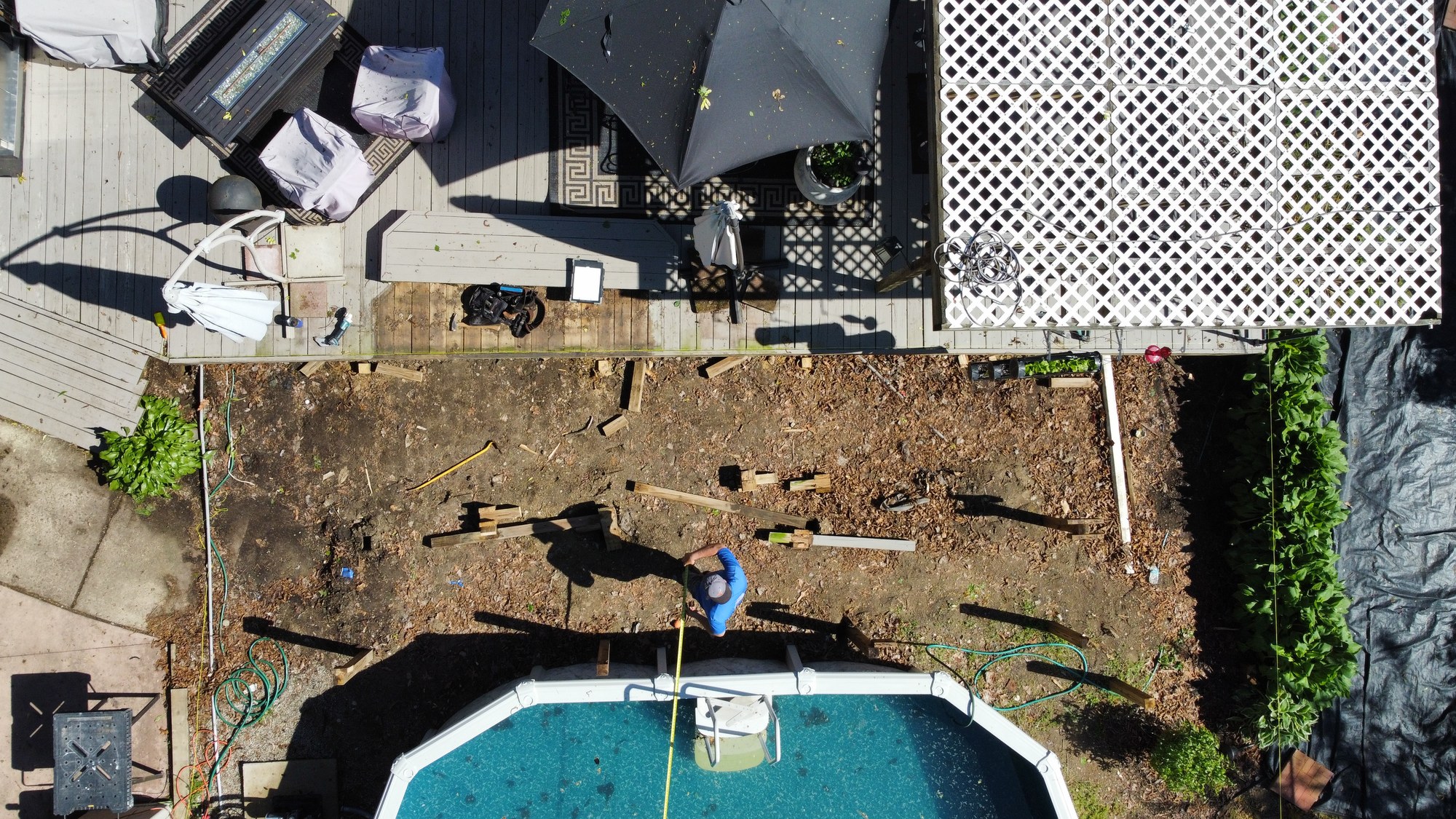 Early aerial view of the pool deck work area