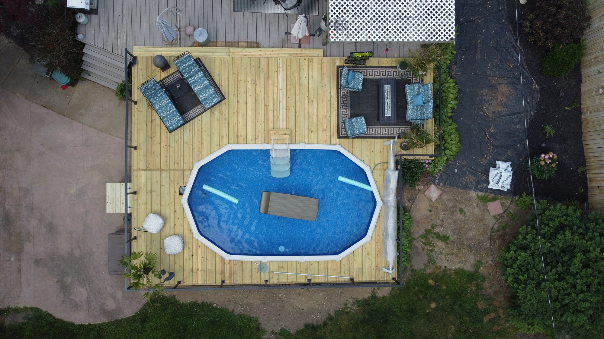 Straight-down aerial view of the finished pool deck